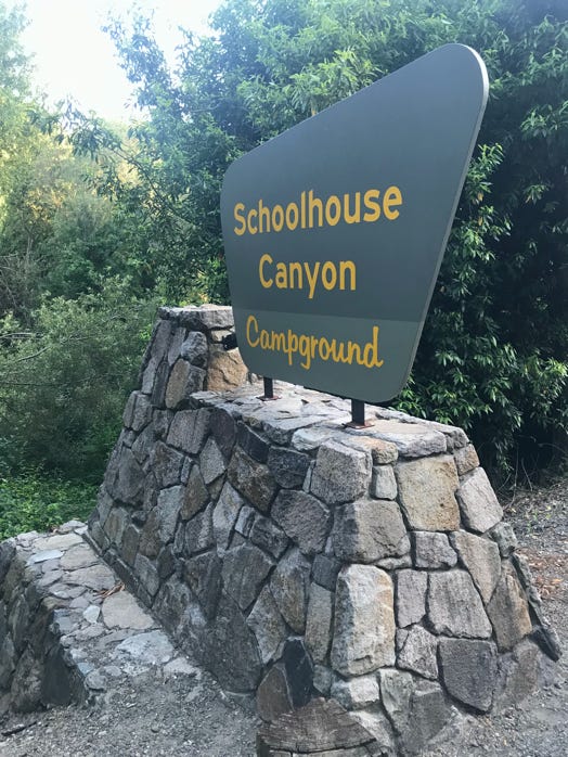 Monument street sign of Schoolhouse Canyon Camoground