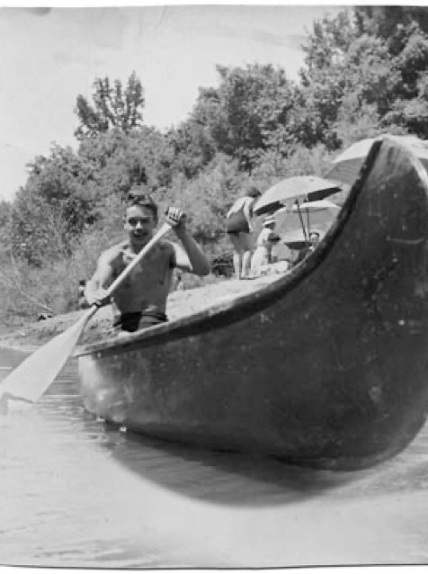 Grandpa Jack in his late teens on a canoe in the Russian River