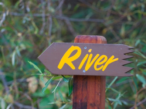 river arrow sign