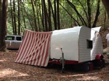 tiny trailer and striped tent