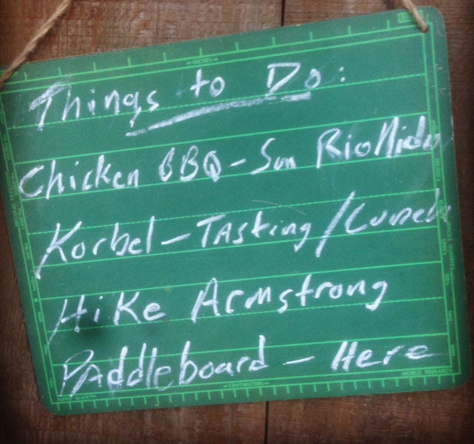 Chaulkboard with suggestions of things to do while camping at Schoolhouse Canyon